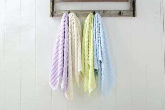 Organic bamboo gym towel rolled showing soft fabric
